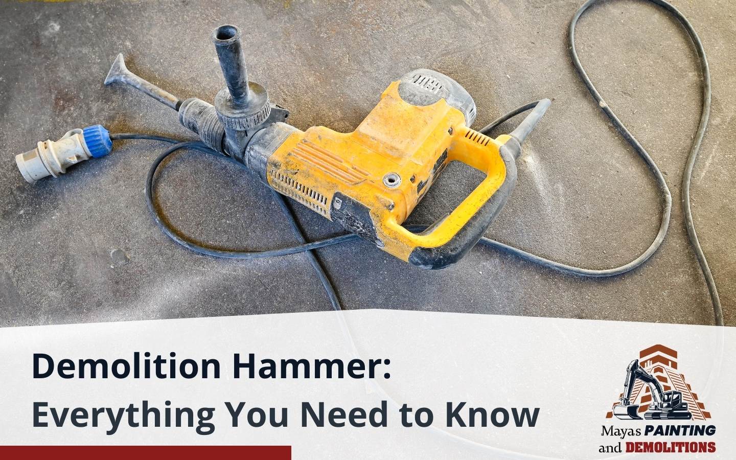 A demolition hammer breaking through a concrete wall with precision.