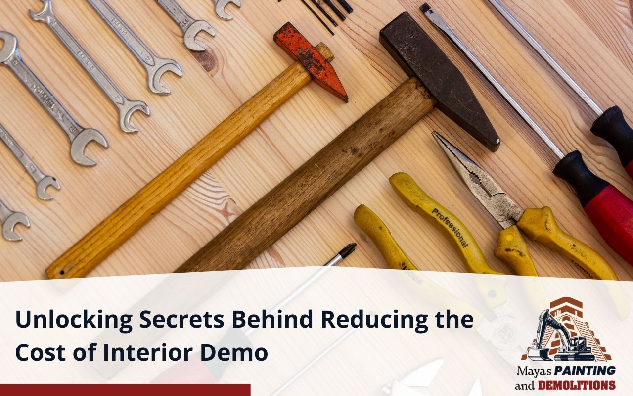 Tools for cost-effective interior demo including pry bars, hammers, and saws